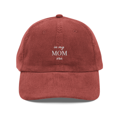 Burgundy embroidered ‘in my mom era’ hat inspired by Taylor Swift. Minimalist corduroy-style baseball cap for moms, Swiftie fans, cozy everyday wear and casual mom aesthetic.