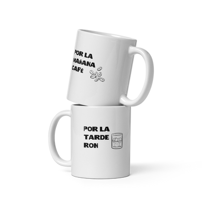 White ceramic mug with 'Por la mañana café, por la tarde ron' text, inspired by Bad Bunny, ideal for coffee and rum enthusiasts