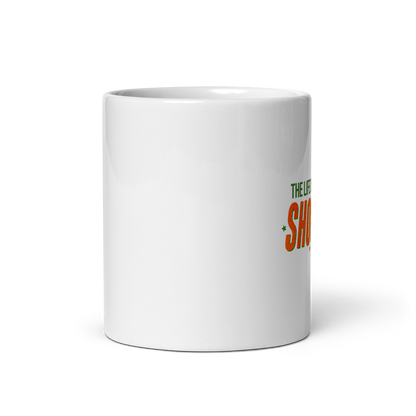 White ceramic mug with bold retro typography reading 'The Life of a Showgirl', Taylor Swift inspired fan merch, perfect gift for Swifties and music lovers.