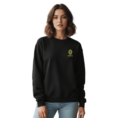 Black crewneck sweatshirt with small colorful embroidered ‘Benito’ crest logo on the chest, inspired by Bad Bunny merchandise, DtMF era streetwear, and minimalist tour-style apparel