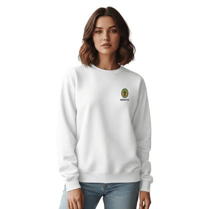 White crewneck sweatshirt with small colorful embroidered ‘Benito’ crest logo on the chest, inspired by Bad Bunny merchandise, DtMF era streetwear, and minimalist tour-style apparel