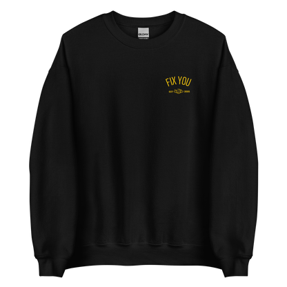 Black minimalist crewneck featuring yellow “Fix You” typography with subtle graphic detail - Coldplay inspired band merch, aesthetic Coldplay “Fix You” song fan apparel