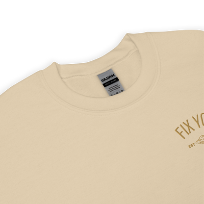 Sand minimalist crewneck featuring maroon “Fix You” typography with subtle graphic detail - Coldplay inspired band merch, aesthetic Coldplay “Fix You” song fan apparel