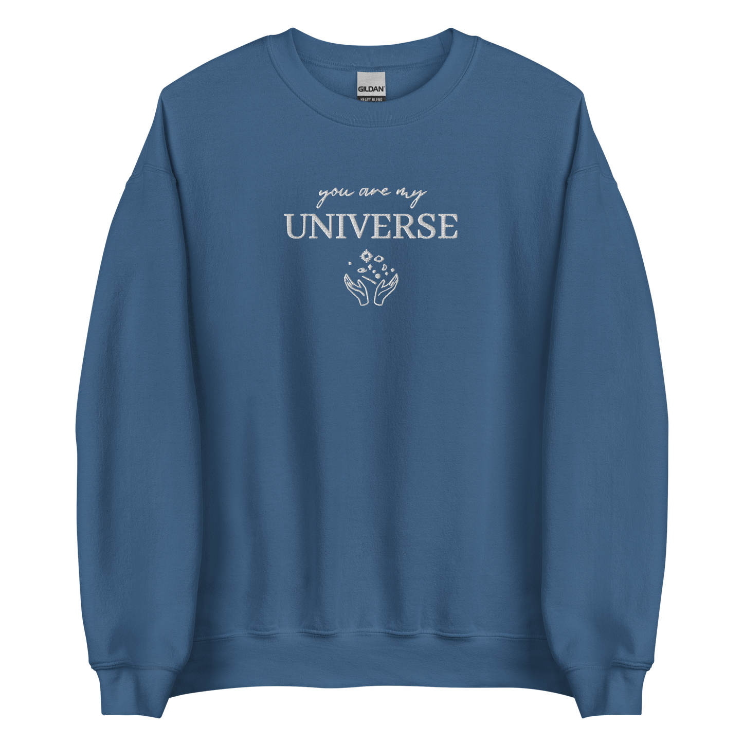 Indigo blue crewneck sweatshirt featuring white typography that reads “you are my Universe” with minimalist hands holding stars illustration -inspired by Coldplay’s hit song “My Universe”, aesthetic fan apparel for music lovers.