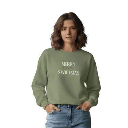Model wearing a green Merry Swiftmas sweatshirt inspired by Taylor Swift, perfect for Swifties