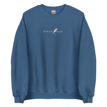 Indigo blue crewneck sweatshirt with delicate white script reading “all’s fair in love and poetry,” inspired by Taylor Swift TTPD (The Tortured Poets Department) aesthetic, cozy unisex fan merch pullover