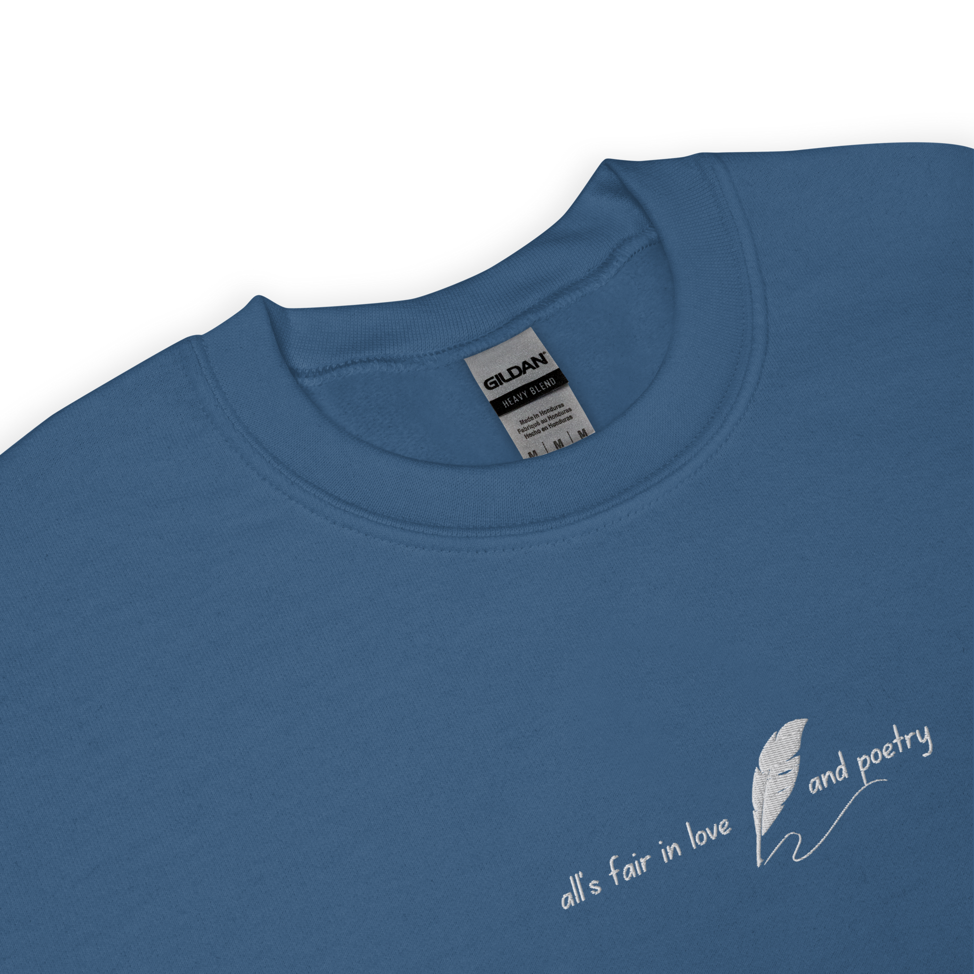Indigo blue crewneck sweatshirt with delicate white script reading “all’s fair in love and poetry,” inspired by Taylor Swift TTPD (The Tortured Poets Department) aesthetic, cozy unisex fan merch pullover