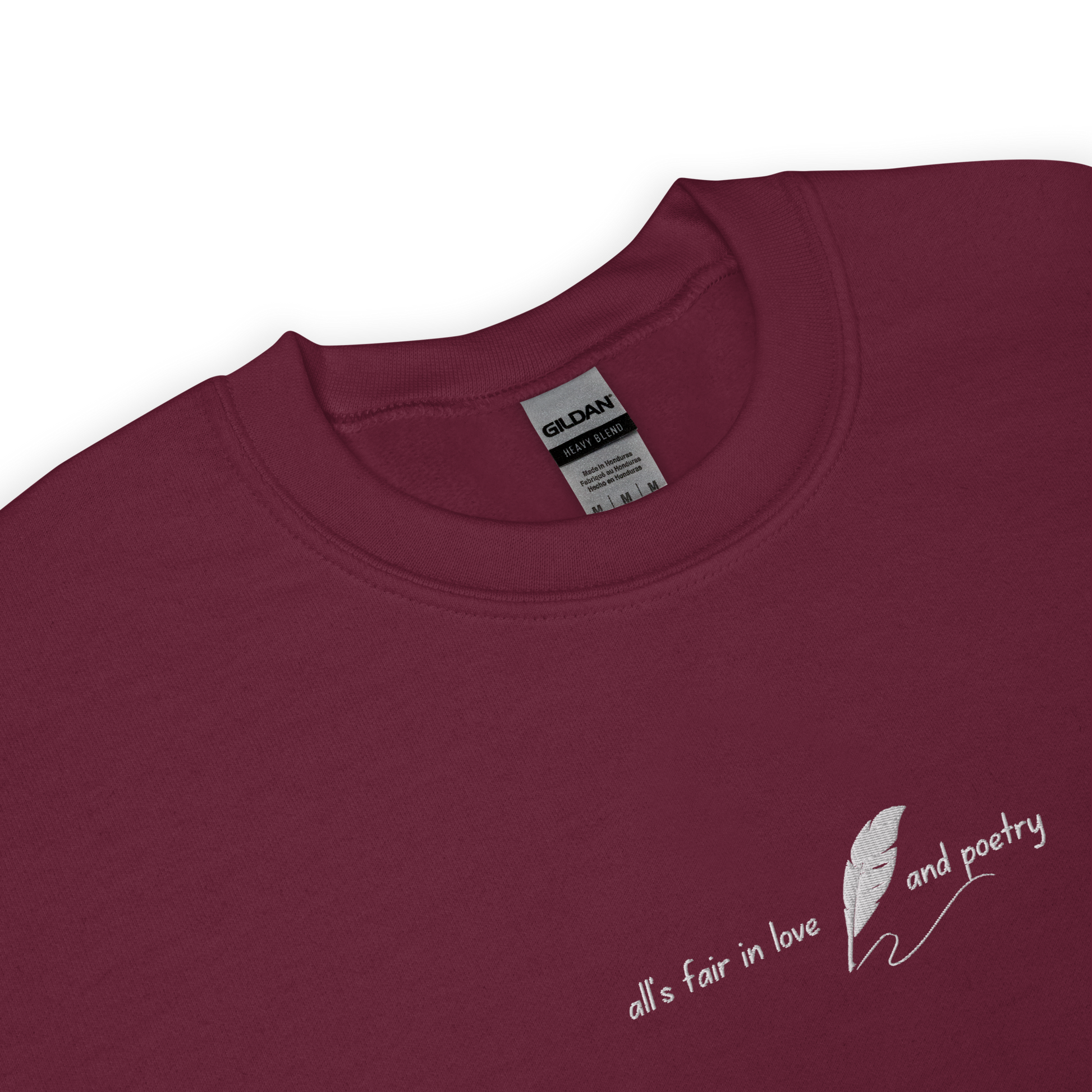 Maroon crewneck sweatshirt with delicate white script reading “all’s fair in love and poetry,” inspired by Taylor Swift TTPD (The Tortured Poets Department) aesthetic, cozy unisex fan merch pullover