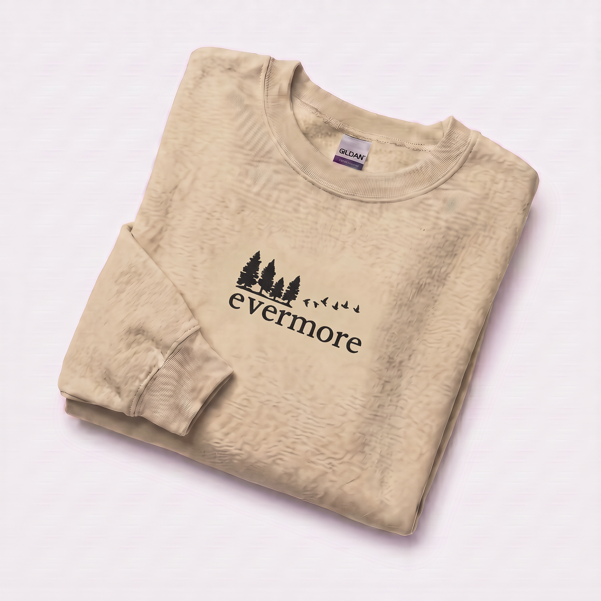 Folded sand evermore era sweatshirt, Taylor Swift-inspired embroidered forest and bird design, cozy cottagecore crewneck for Swifties