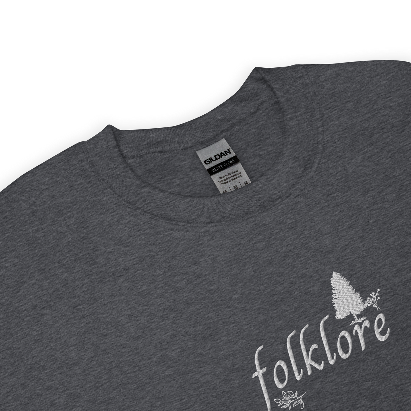 Dark heather folklore sweatshirt inspired by Taylor Swift’s folklore era, featuring minimalist gold ‘folklore’ lettering and tree graphic on a cozy crewneck pullover, aesthetic indie music merch