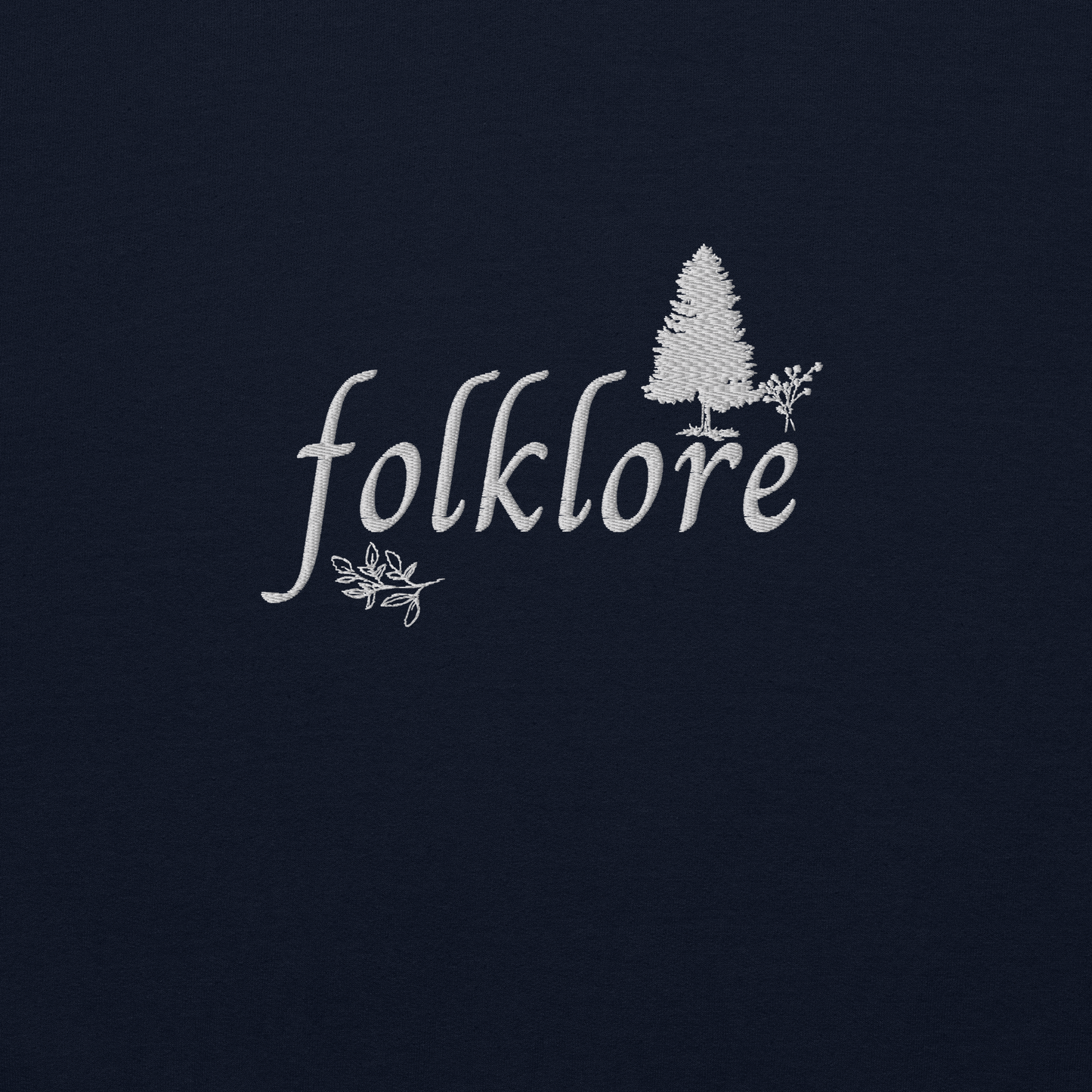 Navy folklore sweatshirt inspired by Taylor Swift’s folklore era, featuring minimalist gold ‘folklore’ lettering and tree graphic on a cozy crewneck pullover, aesthetic indie music merch