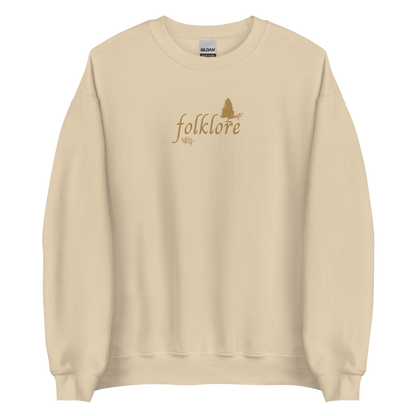 Sand folklore sweatshirt inspired by Taylor Swift’s folklore era, featuring minimalist gold ‘folklore’ lettering and tree graphic on a cozy crewneck pullover, aesthetic indie music merch