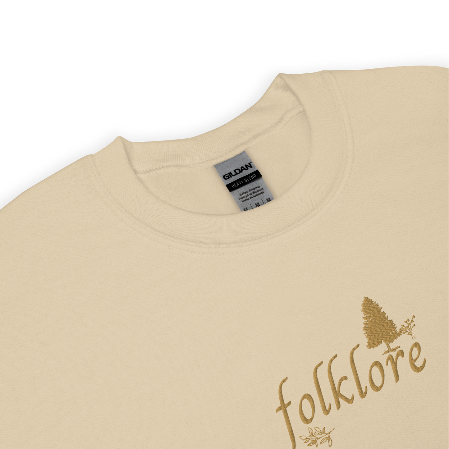 Sand folklore sweatshirt inspired by Taylor Swift’s folklore era, featuring minimalist gold ‘folklore’ lettering and tree graphic on a cozy crewneck pullover, aesthetic indie music merch