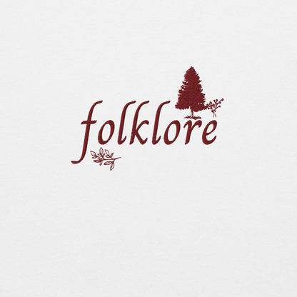 White folklore sweatshirt inspired by Taylor Swift’s folklore era, featuring minimalist gold ‘folklore’ lettering and tree graphic on a cozy crewneck pullover, aesthetic indie music merch