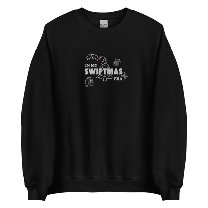 Black sweatshirt with red “In My Swiftmas Era” graphic featuring festive Christmas doodles, Taylor Swift inspired holiday sweatshirt for Swiftie fans