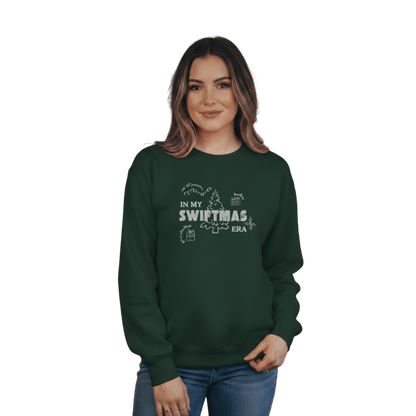 Forest green sweatshirt with red “In My Swiftmas Era” graphic featuring festive Christmas doodles, Taylor Swift inspired holiday sweatshirt for Swiftie fans