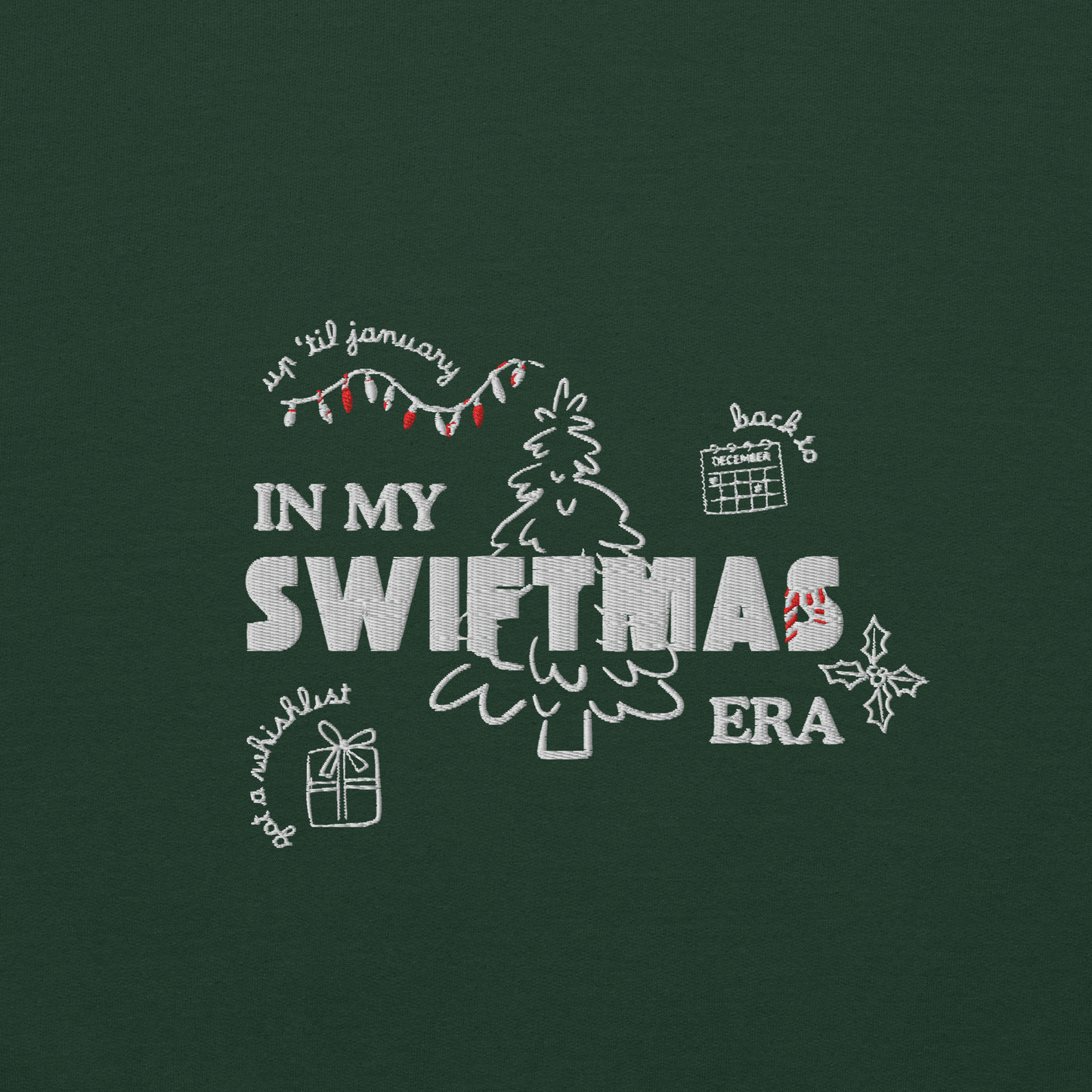 Forest green sweatshirt with red “In My Swiftmas Era” graphic featuring festive Christmas doodles, Taylor Swift inspired holiday sweatshirt for Swiftie fans