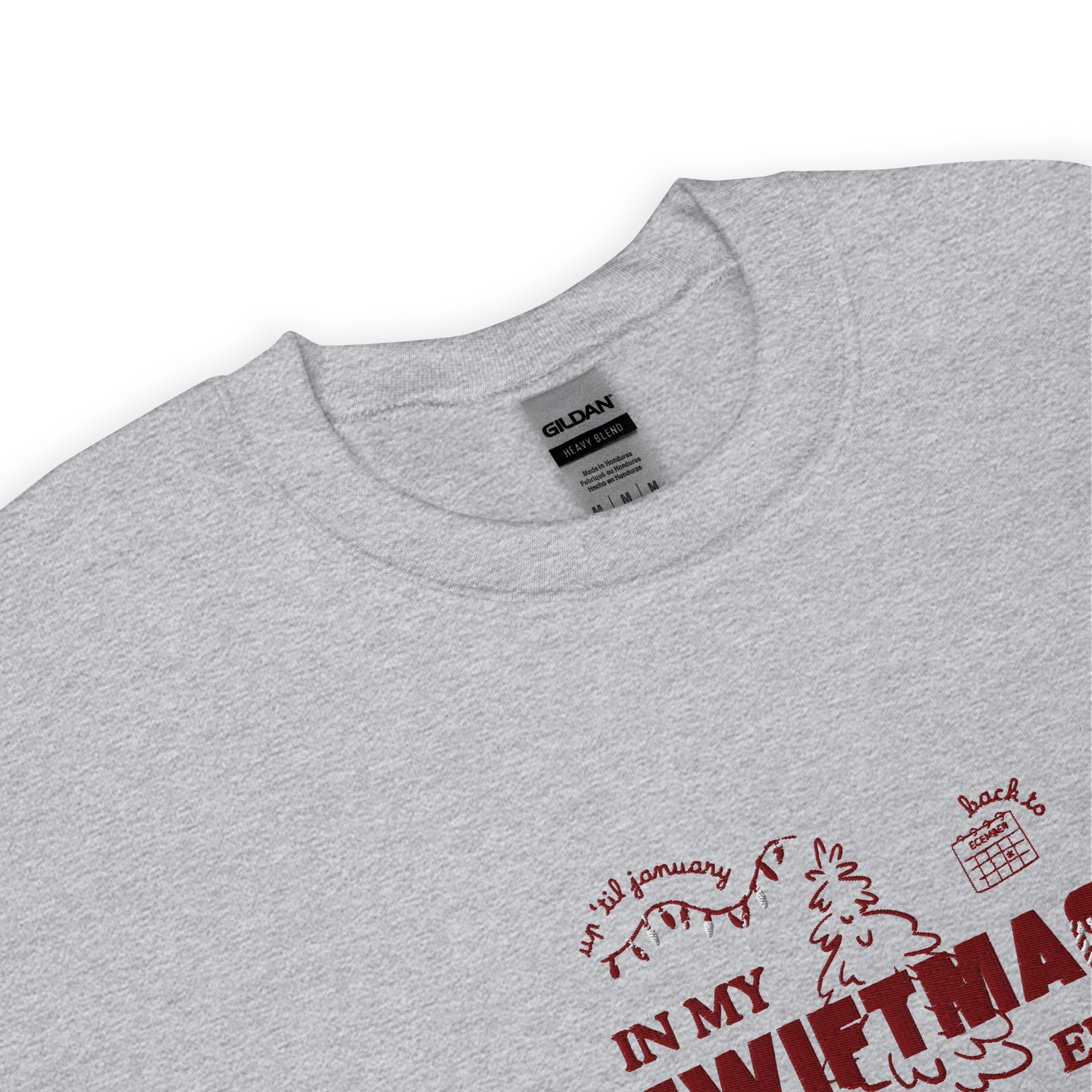 Grey sweatshirt with red “In My Swiftmas Era” graphic featuring festive Christmas doodles, Taylor Swift inspired holiday sweatshirt for Swiftie fans