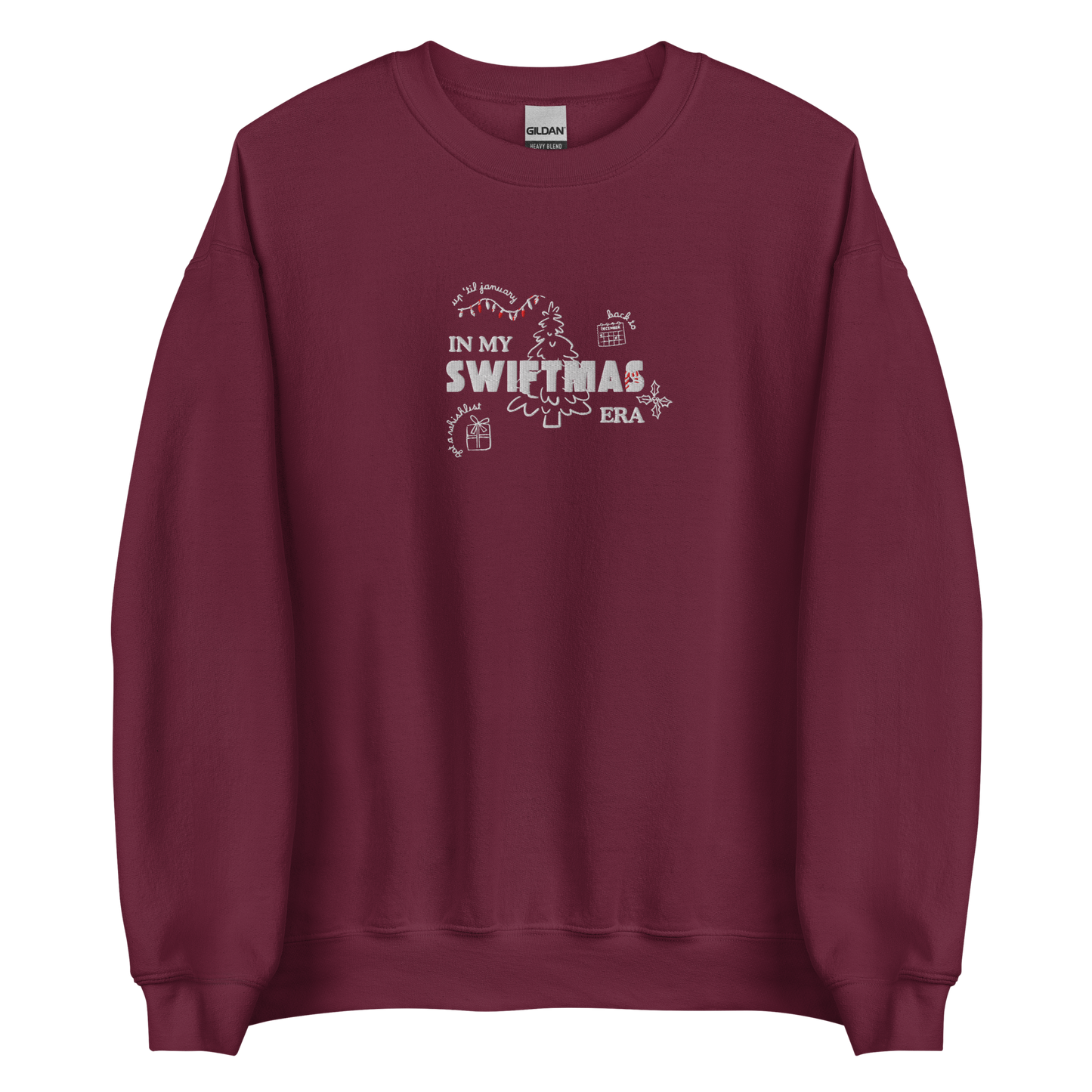 Maroon sweatshirt with red “In My Swiftmas Era” graphic featuring festive Christmas doodles, Taylor Swift inspired holiday sweatshirt for Swiftie fans