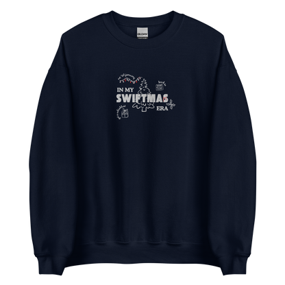 Navy sweatshirt with red “In My Swiftmas Era” graphic featuring festive Christmas doodles, Taylor Swift inspired holiday sweatshirt for Swiftie fans