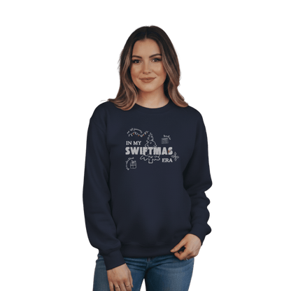 Navy sweatshirt with red “In My Swiftmas Era” graphic featuring festive Christmas doodles, Taylor Swift inspired holiday sweatshirt for Swiftie fans
