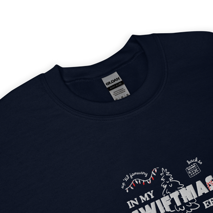 Navy sweatshirt with red “In My Swiftmas Era” graphic featuring festive Christmas doodles, Taylor Swift inspired holiday sweatshirt for Swiftie fans