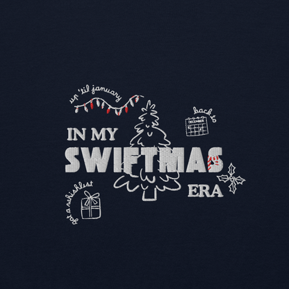Navy sweatshirt with red “In My Swiftmas Era” graphic featuring festive Christmas doodles, Taylor Swift inspired holiday sweatshirt for Swiftie fans