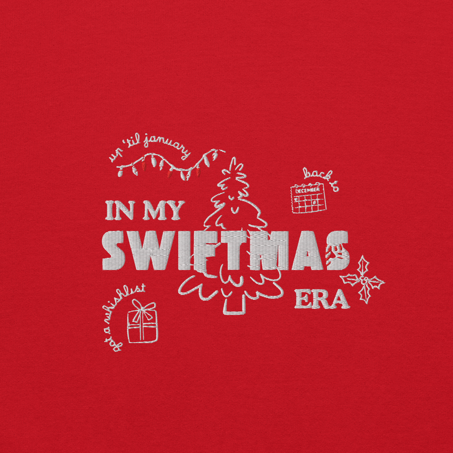 Red sweatshirt with red “In My Swiftmas Era” graphic featuring festive Christmas doodles, Taylor Swift inspired holiday sweatshirt for Swiftie fans