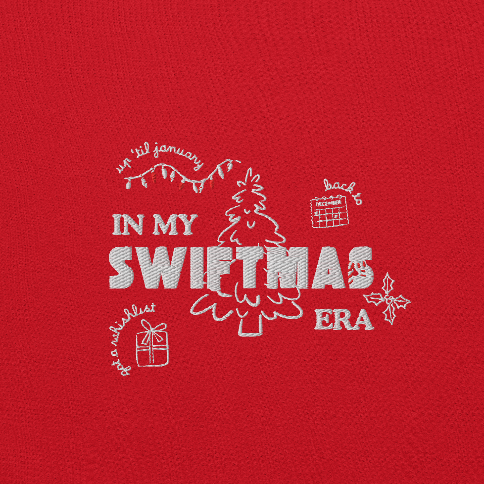 Red sweatshirt with red “In My Swiftmas Era” graphic featuring festive Christmas doodles, Taylor Swift inspired holiday sweatshirt for Swiftie fans