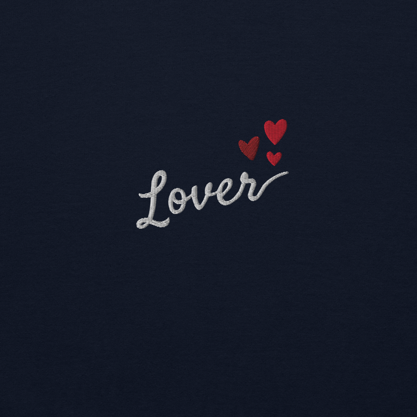 Navy Lover sweatshirt inspired by Taylor Swift’s Lover era, featuring minimalist ‘Lover’ text with small heart details on a cozy pastel crewneck, soft romantic pop aesthetic merch