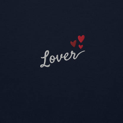 Navy Lover sweatshirt inspired by Taylor Swift’s Lover era, featuring minimalist ‘Lover’ text with small heart details on a cozy pastel crewneck, soft romantic pop aesthetic merch