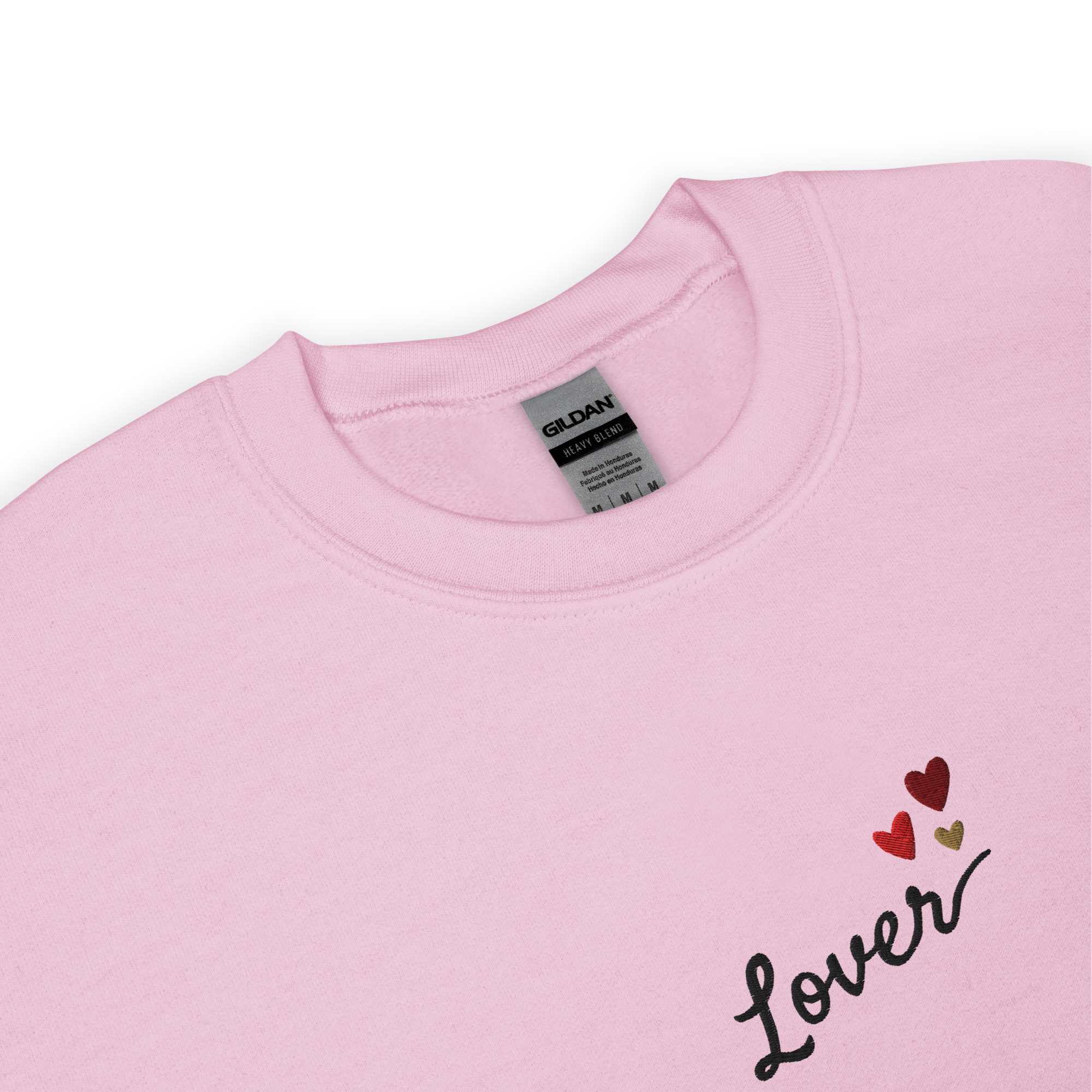 Light pink Lover sweatshirt inspired by Taylor Swift’s Lover era, featuring minimalist ‘Lover’ text with small heart details on a cozy pastel crewneck, soft romantic pop aesthetic merch