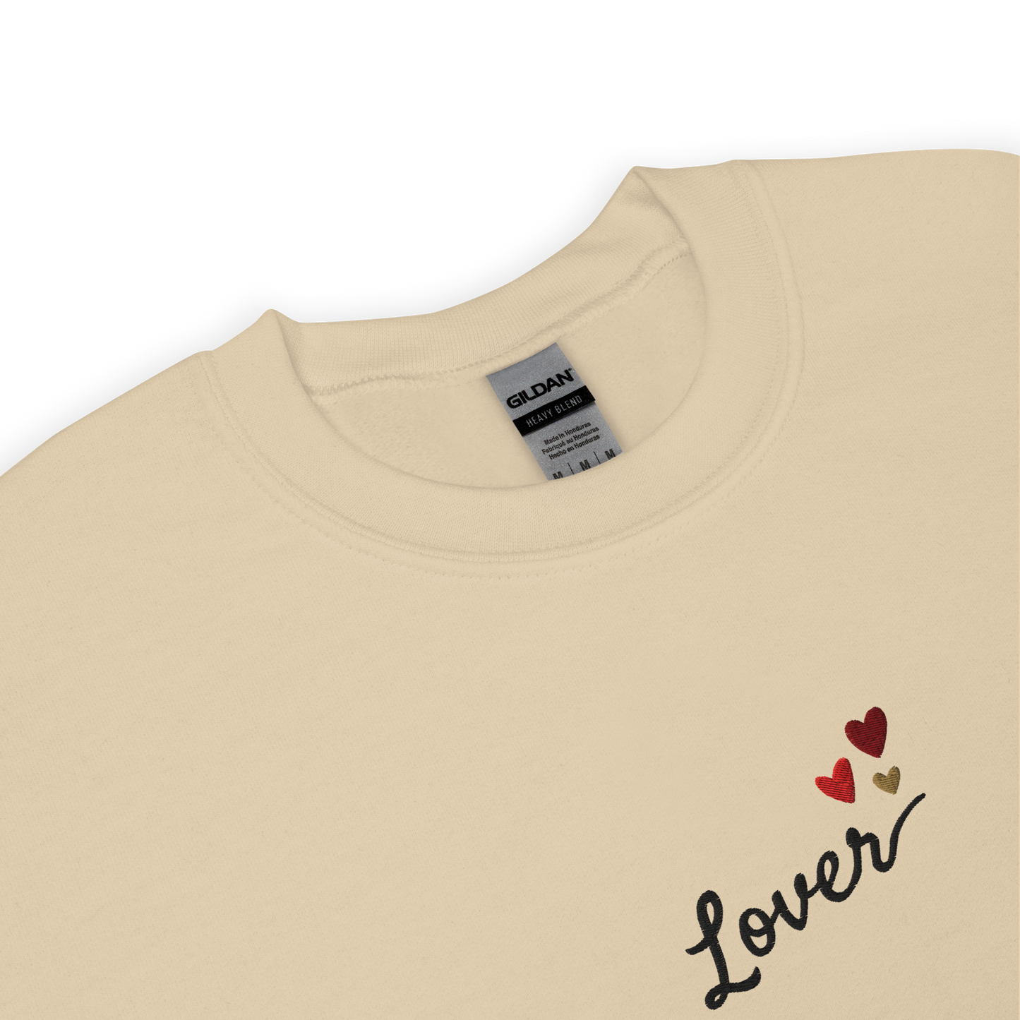 Sand Lover sweatshirt inspired by Taylor Swift’s Lover era, featuring minimalist ‘Lover’ text with small heart details on a cozy pastel crewneck, soft romantic pop aesthetic merch