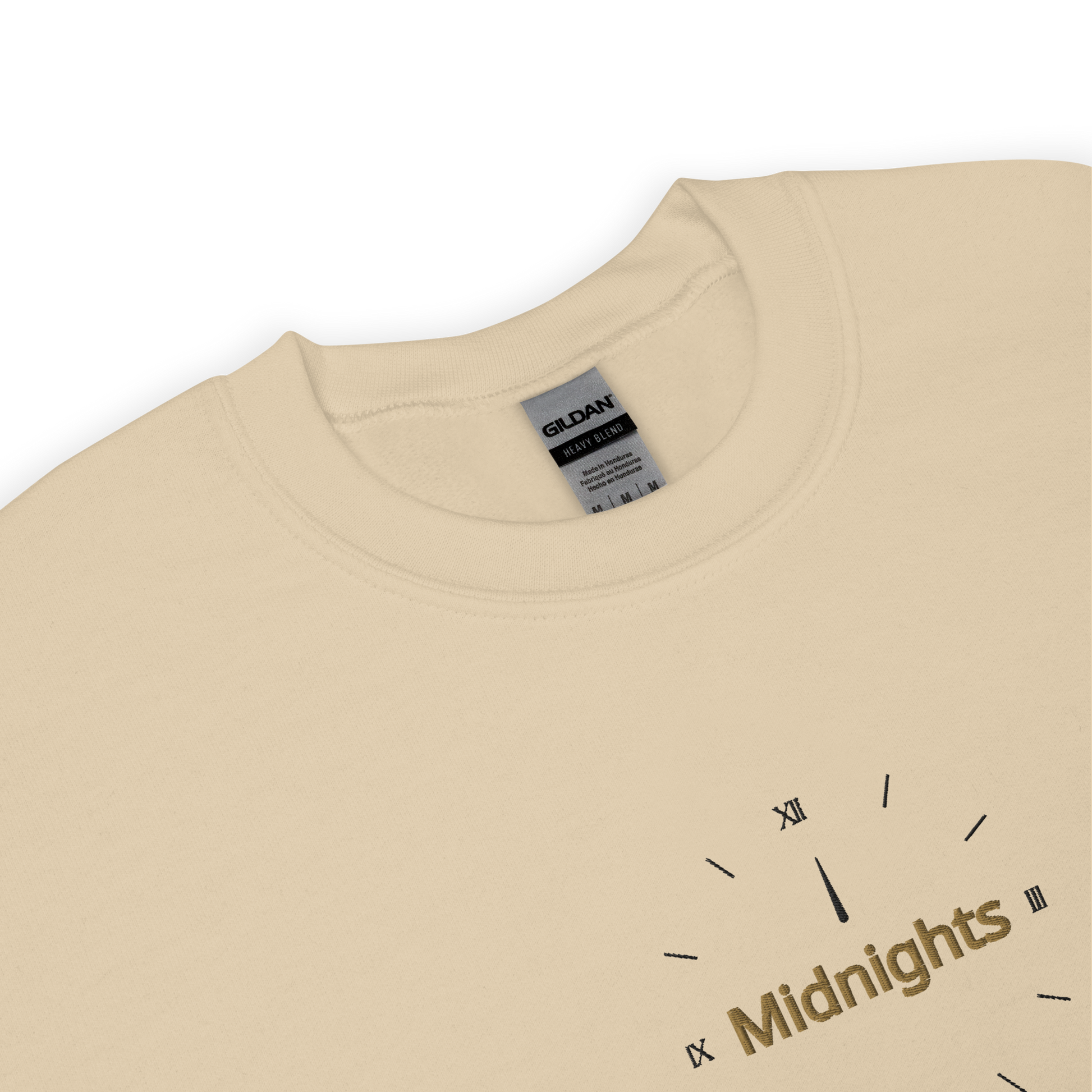 Sand crewneck sweatshirt featuring “Midnights” text with a minimalist clock graphic on the chest, inspired by Taylor Swift’s Midnights album era, cozy unisex pullover fan merch