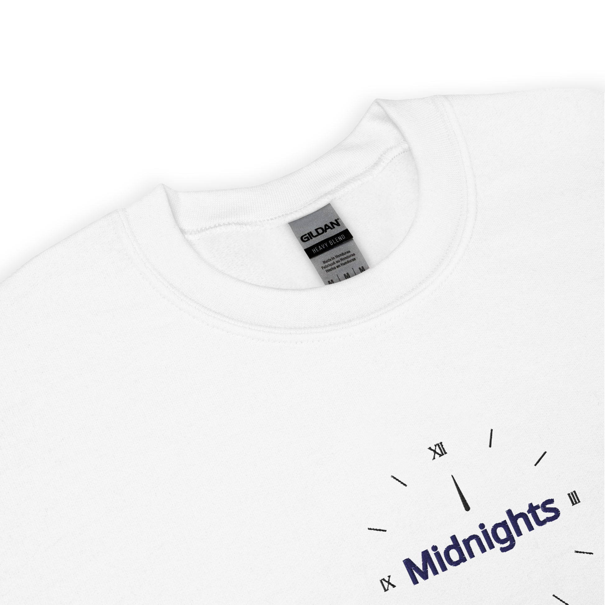 White crewneck sweatshirt featuring “Midnights” text with a minimalist clock graphic on the chest, inspired by Taylor Swift’s Midnights album era, cozy unisex pullover fan merch