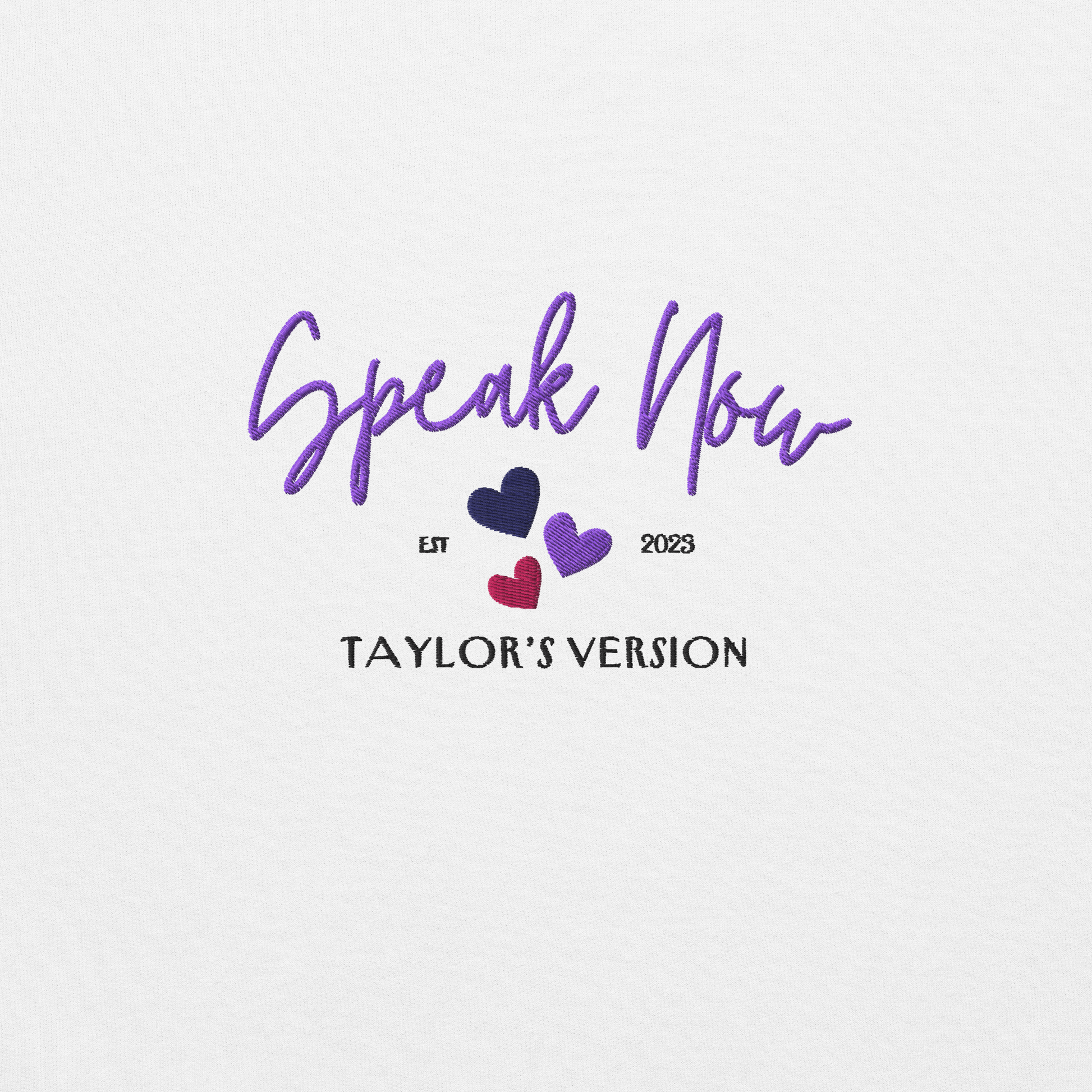 White crewneck Taylor Swift “Speak Now” sweatshirt featuring elegant scripted logo inspired by the Speak Now album era, cozy unisex fan merch perfect for Swifties and everyday wear