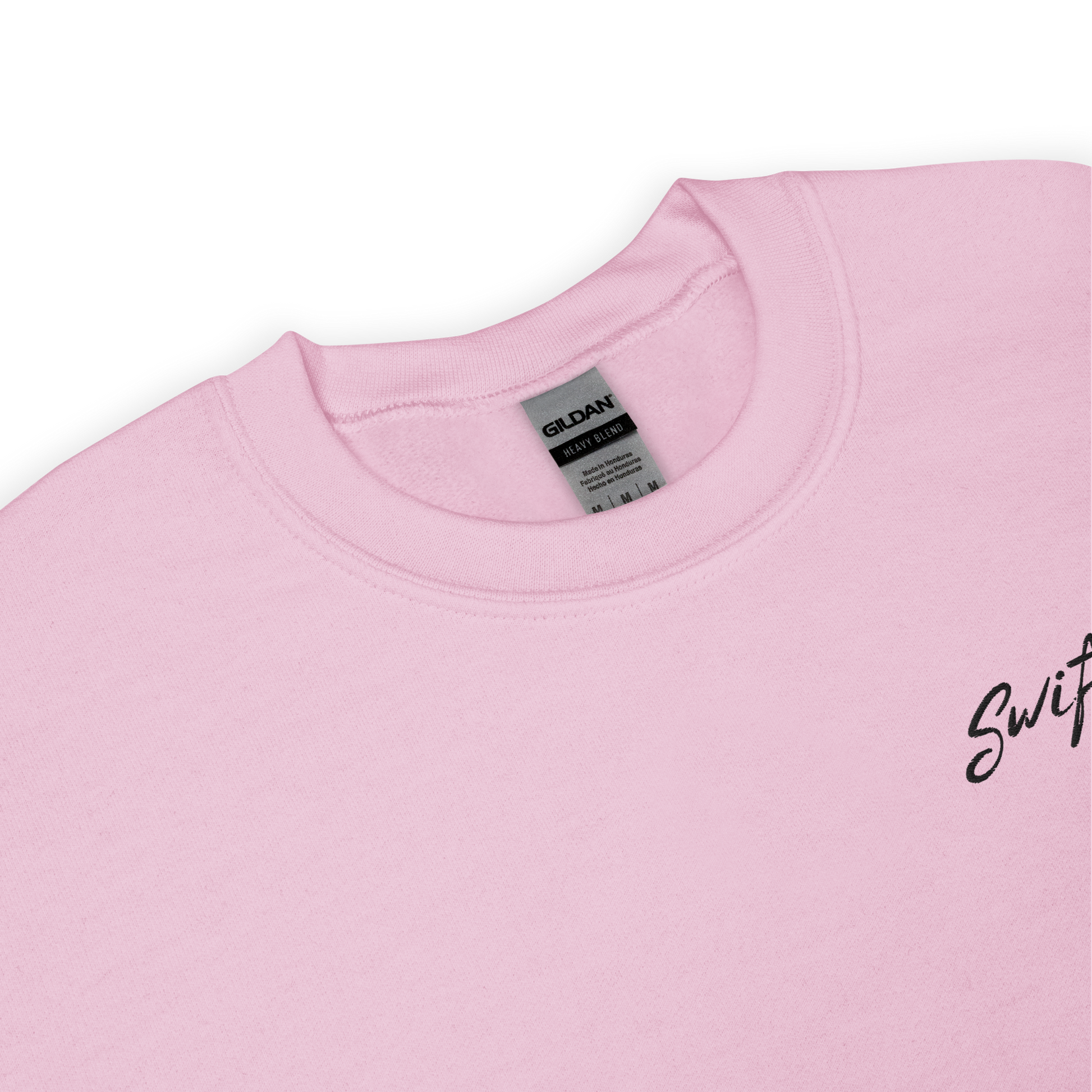 Pink crewneck sweatshirt with black “Swiftie” script and small guitar graphic on the chest, Taylor Swift inspired fan merch, cozy unisex pullover for concerts and everyday wear