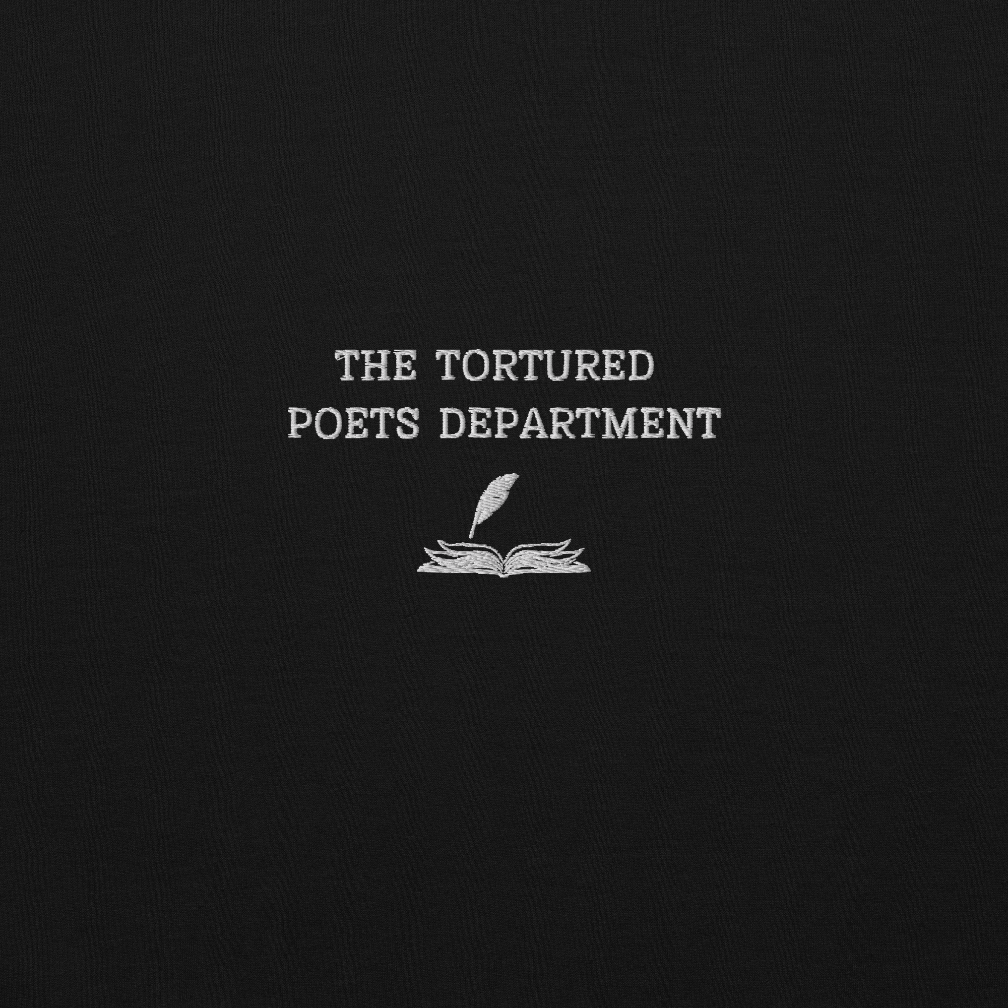 Black The Tortured Poets Department sweatshirt inspired by Taylor Swift, featuring minimalist white text and typewriter graphic on a cozy crewneck pullover, dark academia aesthetic music merch