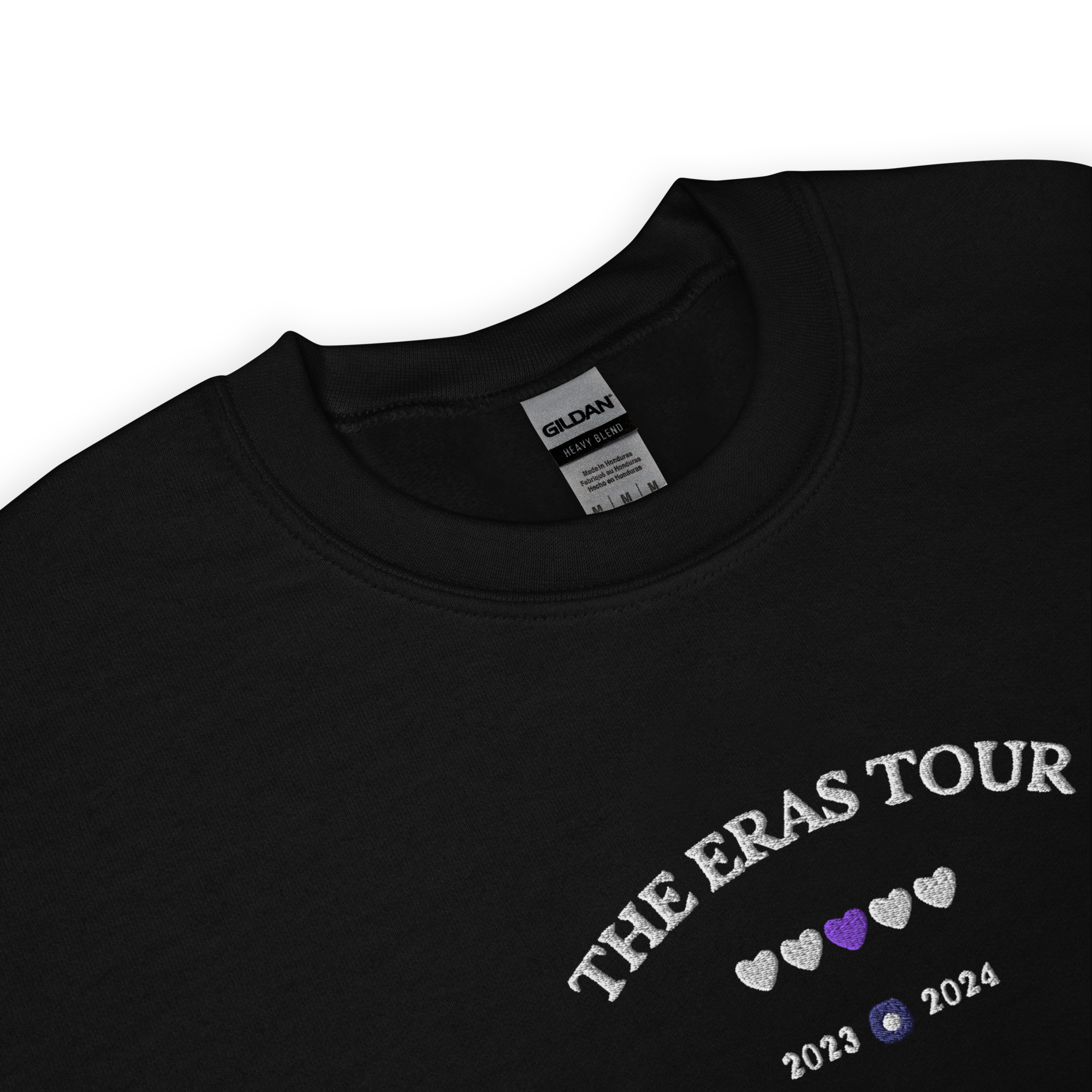 Black Taylor Swift Eras Tour sweatshirt featuring “The Eras Tour” graphic with heart icons and 2023–2024 dates, inspired by Taylor Swift’s record-breaking tour. Unisex oversized crewneck, perfect for Swifties, concert outfits, and official Eras Tour merch style looks