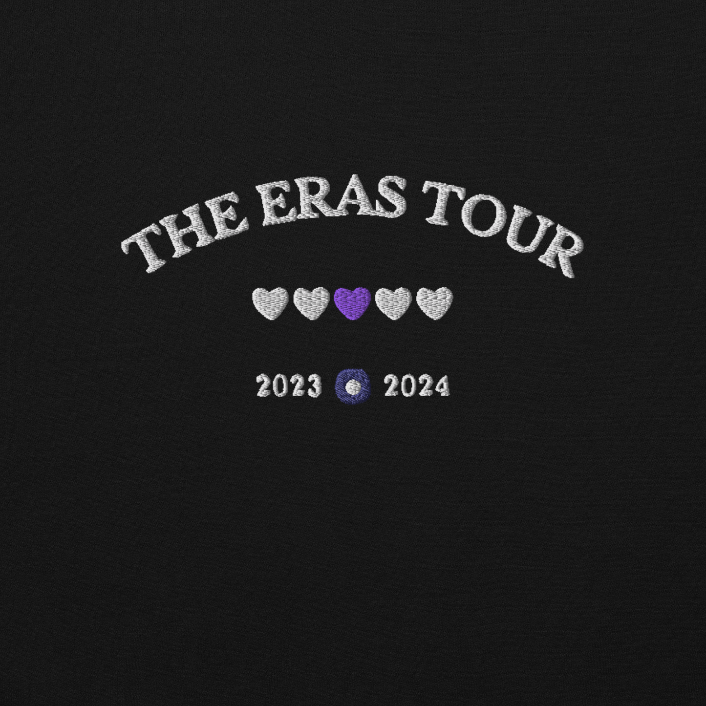 Black Taylor Swift Eras Tour sweatshirt featuring “The Eras Tour” graphic with heart icons and 2023–2024 dates, inspired by Taylor Swift’s record-breaking tour. Unisex oversized crewneck, perfect for Swifties, concert outfits, and official Eras Tour merch style looks