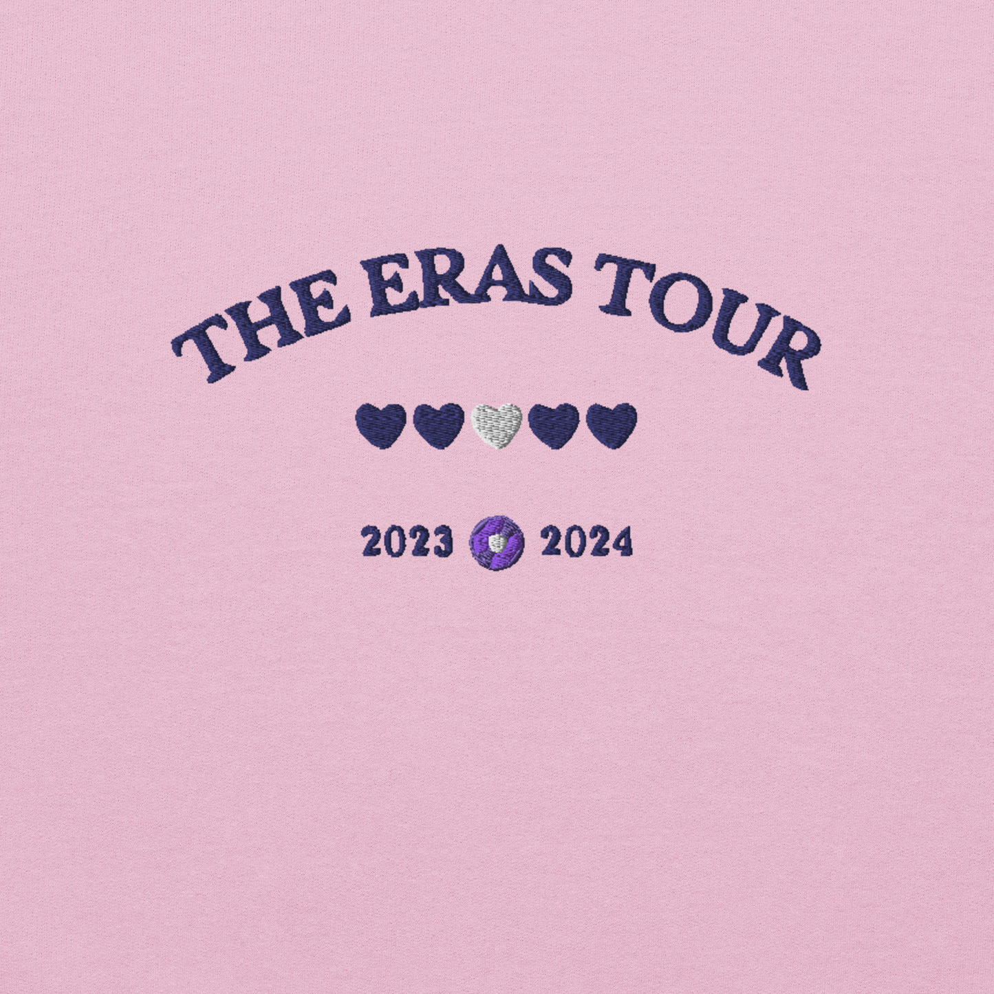 Pink Taylor Swift Eras Tour sweatshirt featuring “The Eras Tour” graphic with heart icons and 2023–2024 dates, inspired by Taylor Swift’s record-breaking tour. Unisex oversized crewneck, perfect for Swifties, concert outfits, and official Eras Tour merch style looks