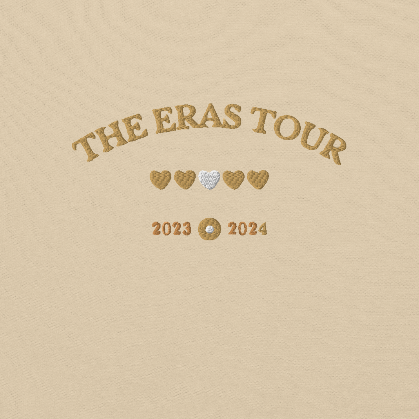 Sand Taylor Swift Eras Tour sweatshirt featuring “The Eras Tour” graphic with heart icons and 2023–2024 dates, inspired by Taylor Swift’s record-breaking tour. Unisex oversized crewneck, perfect for Swifties, concert outfits, and official Eras Tour merch style looks