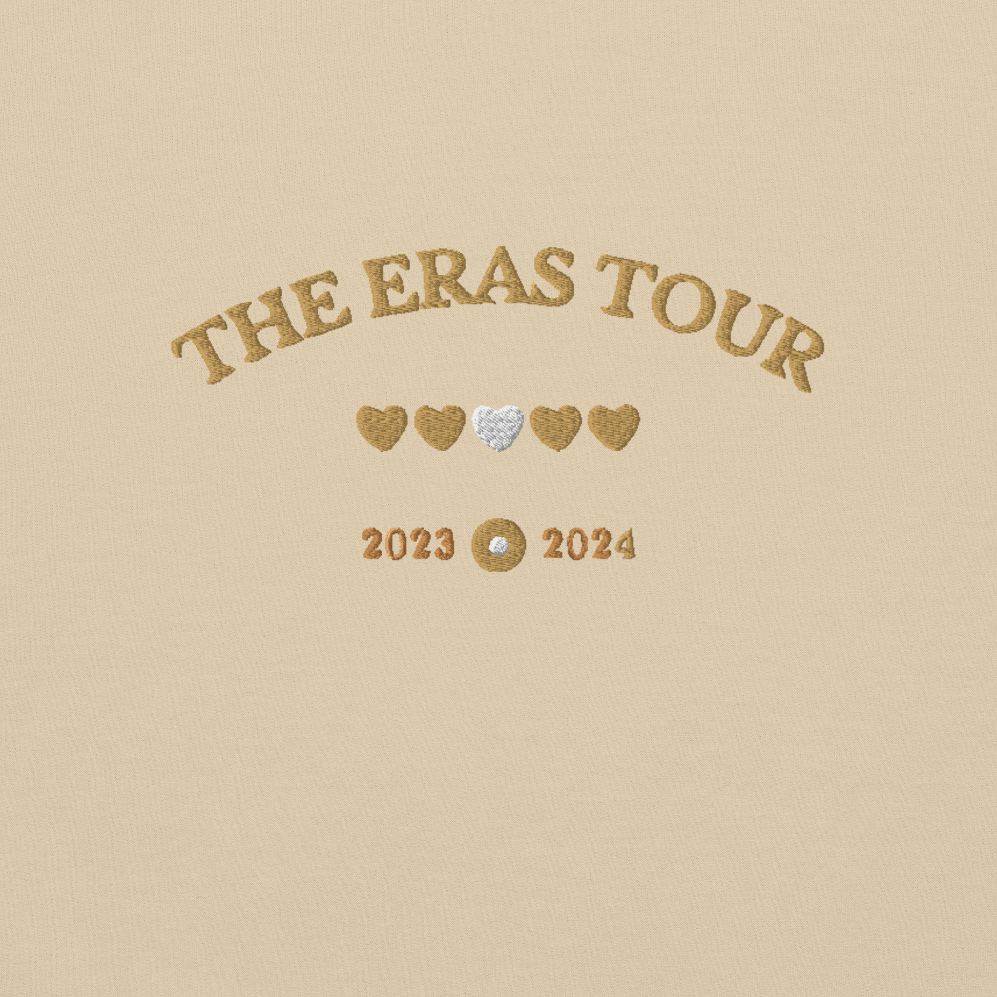 Sand Taylor Swift Eras Tour sweatshirt featuring “The Eras Tour” graphic with heart icons and 2023–2024 dates, inspired by Taylor Swift’s record-breaking tour. Unisex oversized crewneck, perfect for Swifties, concert outfits, and official Eras Tour merch style looks
