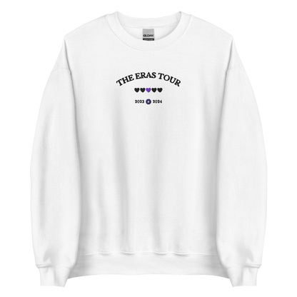 White Taylor Swift Eras Tour sweatshirt featuring “The Eras Tour” graphic with heart icons and 2023–2024 dates, inspired by Taylor Swift’s record-breaking tour. Unisex oversized crewneck, perfect for Swifties, concert outfits, and official Eras Tour merch style looks