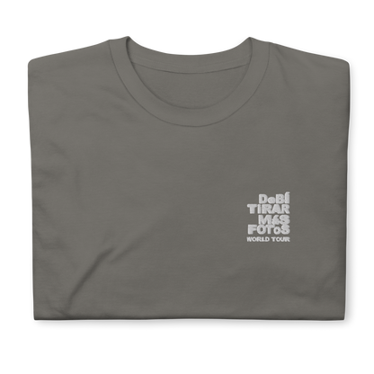 Charcoal crewneck t-shirt featuring small white DTMF World Tour graphic and text inspired by Bad Bunny’s DtMF (Debí Tirar Más Fotos) album and global tour merchandise