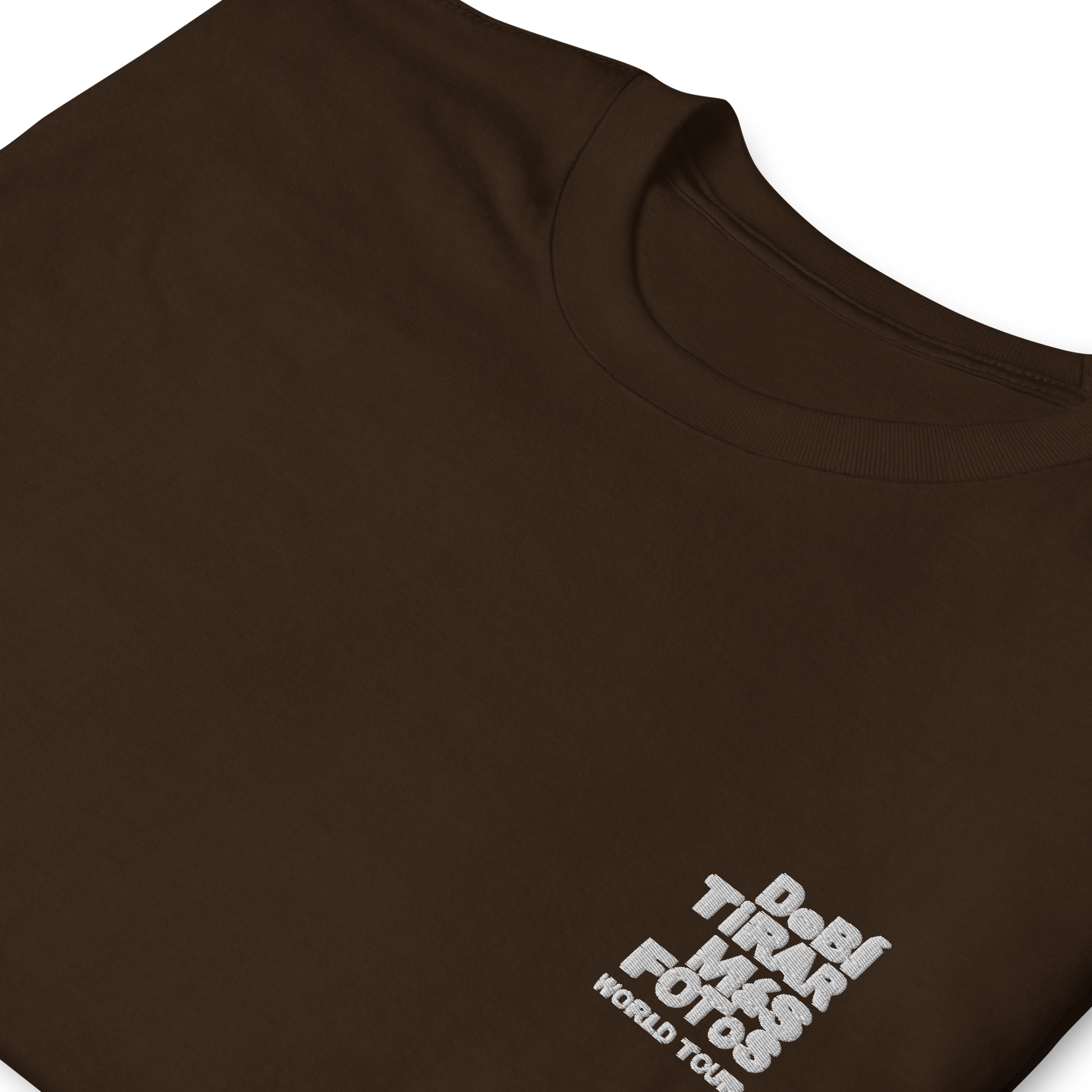 Dark chocolate crewneck t-shirt featuring small white DTMF World Tour graphic and text inspired by Bad Bunny’s DtMF (Debí Tirar Más Fotos) album and global tour merchandise