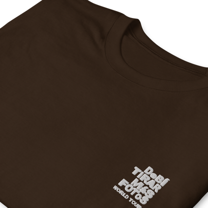 Dark chocolate crewneck t-shirt featuring small white DTMF World Tour graphic and text inspired by Bad Bunny’s DtMF (Debí Tirar Más Fotos) album and global tour merchandise