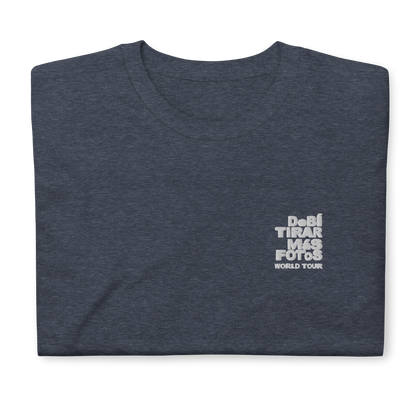 Heather navy crewneck t-shirt featuring small white DTMF World Tour graphic and text inspired by Bad Bunny’s DtMF (Debí Tirar Más Fotos) album and global tour merchandise