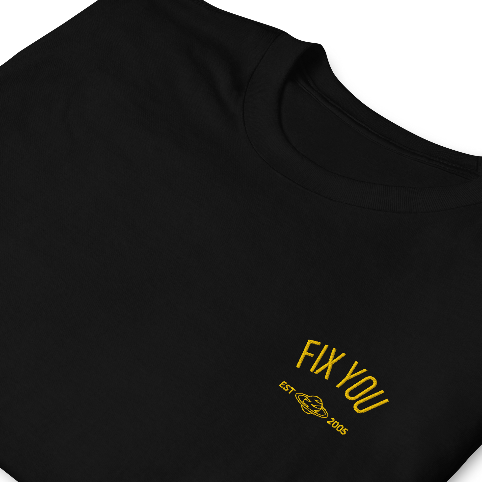 Black minimalist t-shirt featuring yellow “Fix You” typography with subtle graphic detail - Coldplay inspired band merch, aesthetic Coldplay “Fix You” song fan apparel