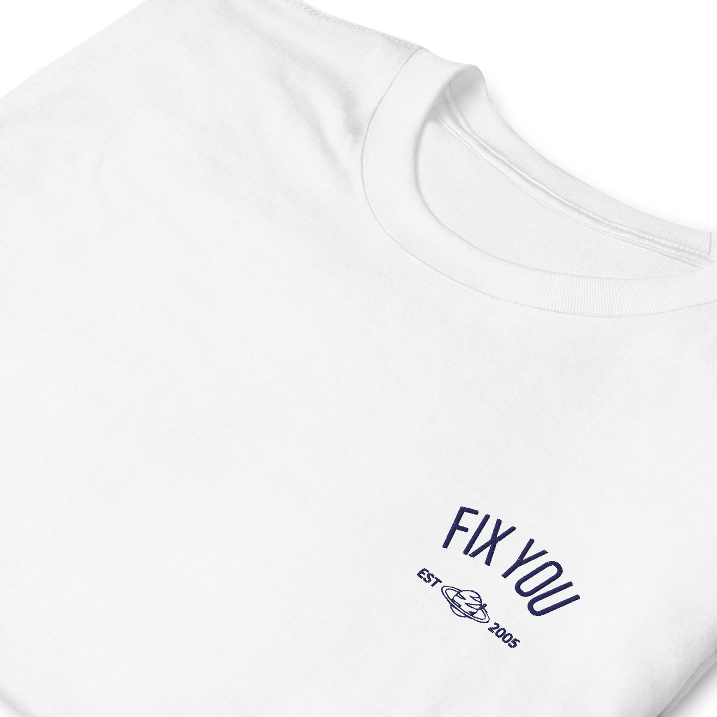 White minimalist t-shirt featuring blue “Fix You” typography with subtle graphic detail - Coldplay inspired band merch, aesthetic Coldplay “Fix You” song fan apparel